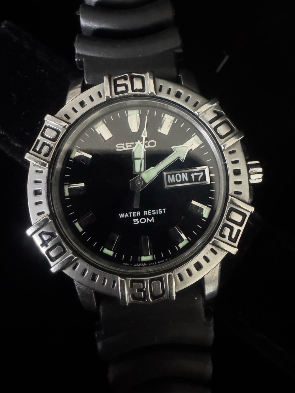 Seiko Black Dial Watch with Silver Bezel